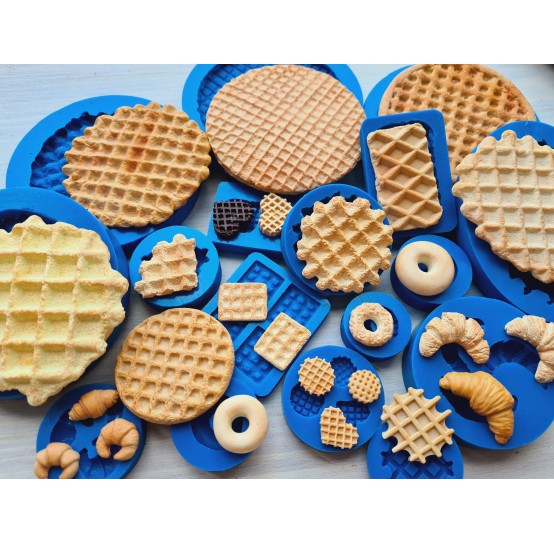 Silicone molds of croissants, waffles, donuts, and other baked goods
